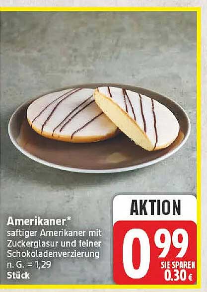 Amerikaner* saftiger Amerikaner mit Zuckerglasur und feiner Schokoladenverzierung n. G. = 1,29 Stück