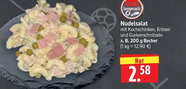 Nudelsalat mit Kochschinken, Erbsen und Gurkenschnitzeln z. B. 200 g Becher (1 kg = 12.90 €)