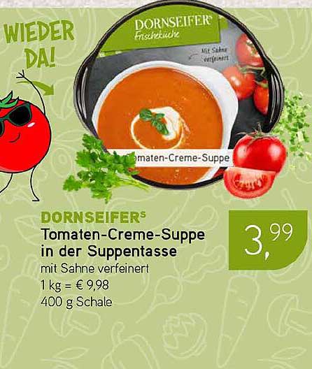 Tomaten-Creme-Suppe in der Suppentasse mit Sahne verfeinert