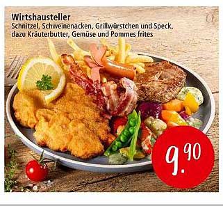 Wirtshaussteller: Schnitzel, Schweinenacken, Grillwürstchen und Speck, dazu Kräuterbutter, Gemüse und Pommes frites