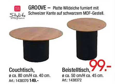 GROOVE – Platte Wildeiche furniert mit Schweizer Kante auf schwarzem MDF-Gestell.