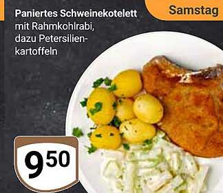 Paniertes Schweinekotelett mit Rahmkohlrabi, dazu Petersilienkartoffeln