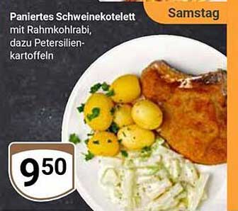 Paniertes Schweinekotelett mit Rahmkohlrabi, dazu Petersilienkartoffeln