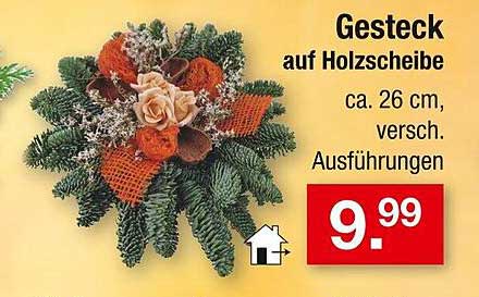 Gesteck auf Holzscheibe