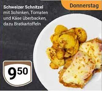 Schweizer Schnitzel mit Schinken, Tomaten und Käse überbacken, dazu Bratkartoffeln