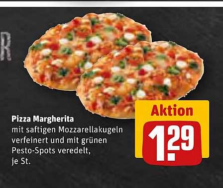 Pizza Margherita mit saftigen Mozzarellakugeln und Pesto-Spots, je St.