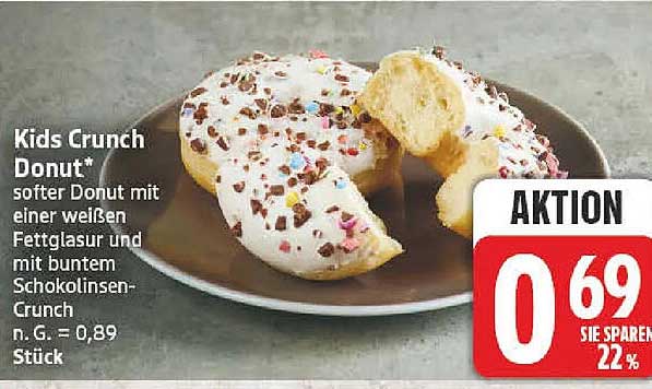 Kids Crunch Donut* softer Donut mit einer weißen Fettglasur und mit buntem Schokolinsen-Crunch