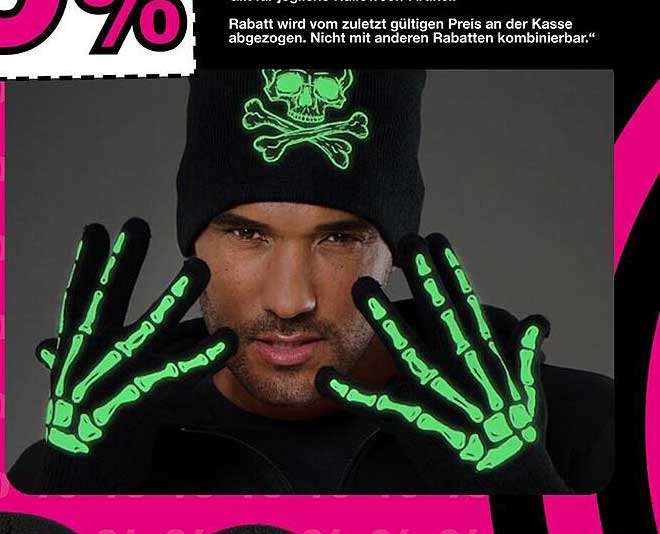 Leuchtende Handschuhe mit Totenkopf-Motiv