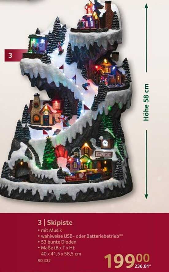 Skipiste mit Musik und Lichtern