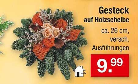 Gesteck auf Holzscheibe