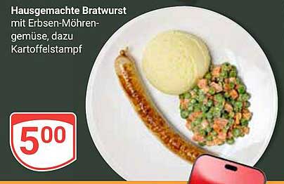 Hausgemachte Bratwurst mit Erbsen-Möhrengemüse, dazu Kartoffelstampf